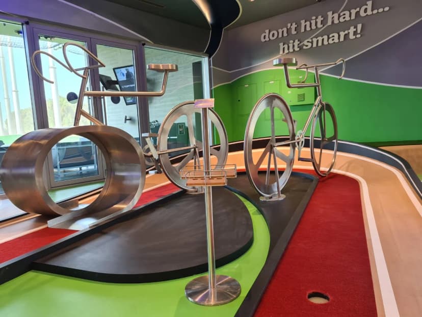 Decorative fabricated metal features for golf venue